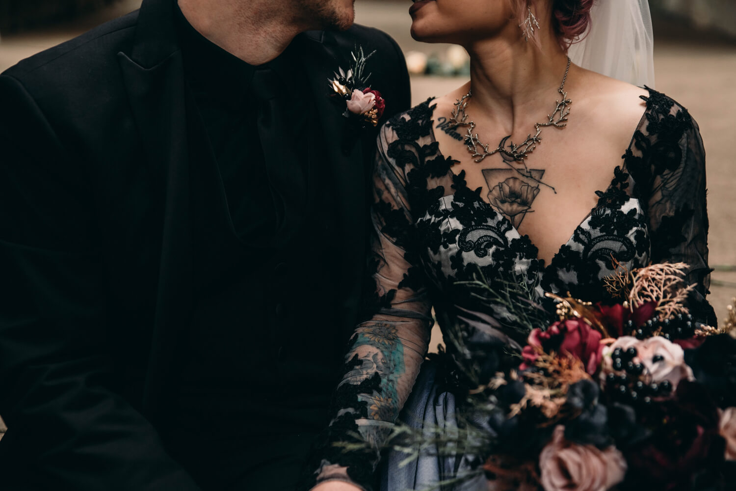 Alternative couple get married in a long black wedding dress in Ohio.