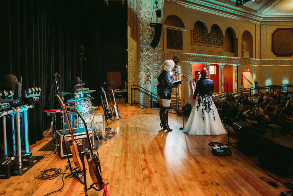 Drag queen officiates this LGBTQ friendly wedding on concert stage at Lasalle.