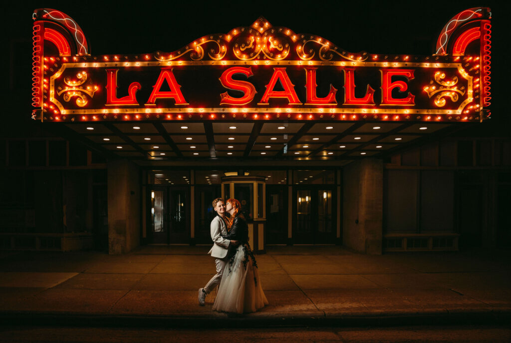 Night photo taken at alternative wedding in front of LaSalle sign in Cleveland.