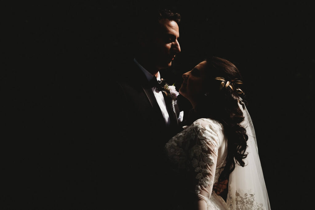 Dark and moody wedding photo in Akron Ohio for gothic couple.