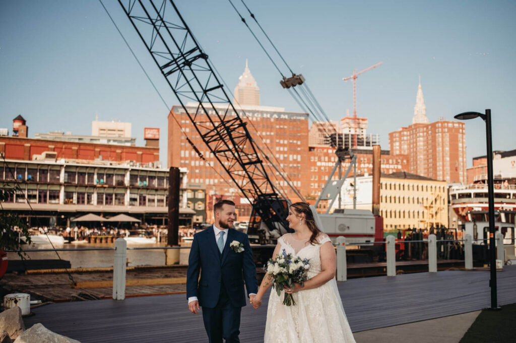 Industrial and river front backdrop for couple's wedding day in Flats.