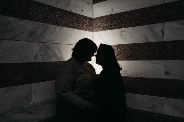 Moody portrait against Cleveland Art Museum's walls.